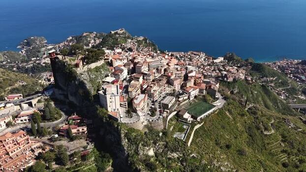 Aerial view of the hilltop village of Castelmola Italy. Aerial view of the hilltop village of Castelmola Italy.