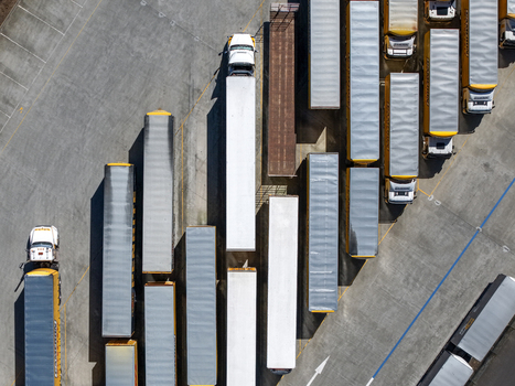 Kilsyth Victoria Australia 20 September 2026 Aerial view of a logistics depot with rows of semi trucks parked on asphalt showcasing industrial transport infrastructure. Kilsyth Victoria Australia 20 September 2026 Aerial view of a logistics depot with rows of semi trucks parked on asphalt showcasing industrial transport infrastructure.