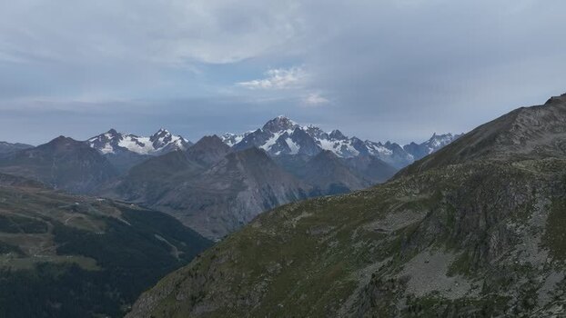 Aerial view of Rutor massif and snow capped peaks in Italy. Aerial view of Rutor massif and snow capped peaks in Italy.