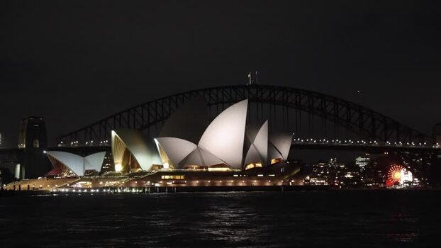 View of the illuminated Sydney Opera House at night Australia.