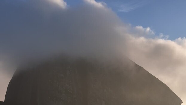 Aerial view of Sugarloaf Mountain peak covered in clouds Brazil. Aerial view of Sugarloaf Mountain peak covered in clouds Brazil.