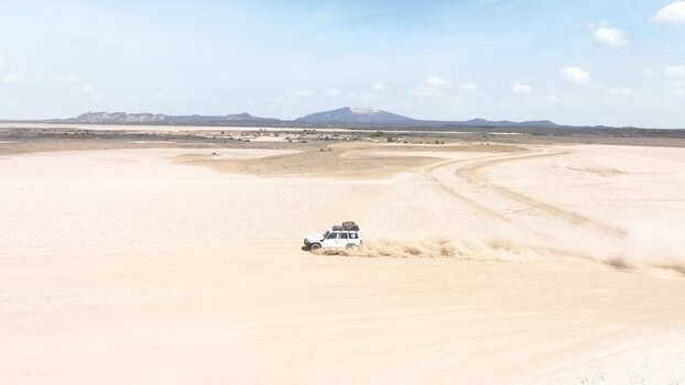 Aerial view of an off road vehicle in Danakil Desert Ethiopia. Aerial view of an off road vehicle in Danakil Desert Ethiopia.