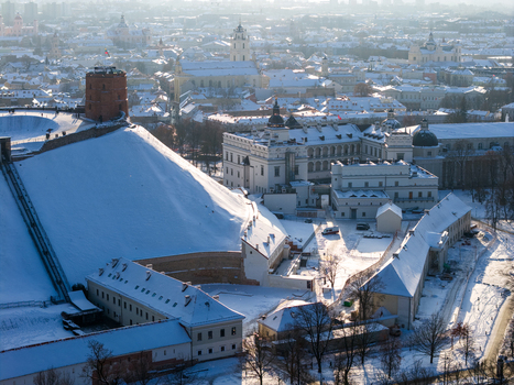Aerial view of Gediminas Tower and the Palace of the Grand Dukes on a snow covered hill in Vilnius County Lithuania.