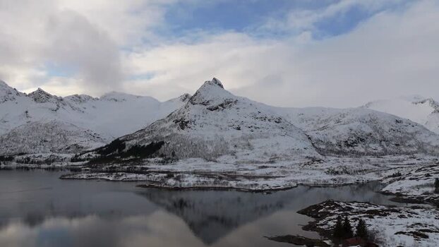 Aerial view of snowy Lofoten mountains in Vagan Municipality Norway.