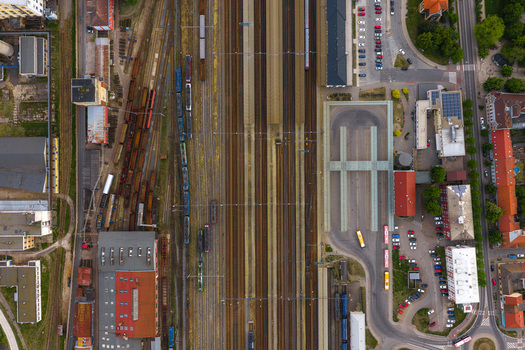 Aerial view of railway tracks platforms and surrounding urban infrastructure in Breclav South Moravian Region Czechia.