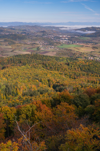 Aerial view of Sitno mountain peak overlooking the colorful autumn forest canopy and the valley of Ilija Banska Bystrica Regio Slovakia. Aerial view of Sitno mountain peak overlooking the colorful autumn forest canopy and the valley of Ilija Banska Bystrica Regio Slovakia.