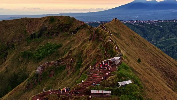 Aerial view of Mount Batur ridge at sunrise Indonesia.