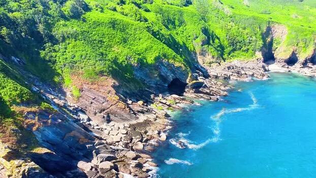 Aerial view of Lantic Bay coastline in Polruan United Kingdom.