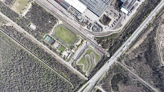 Aerial view of race track and highway France.
