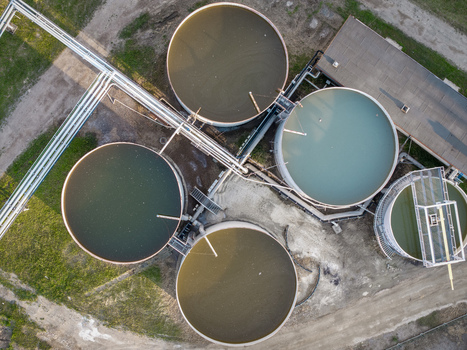 Aerial view of industrial circular tanks and connecting pipelines at the Wieliczka Salt Mine in Wieliczka Lesser Poland Voivode Poland.