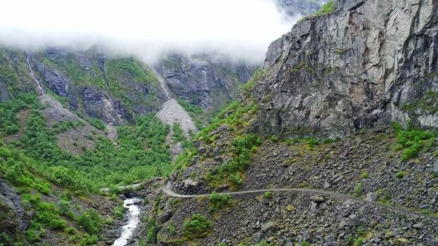 Aerial view of Hardangervidda mountains and winding road Norway. Aerial view of Hardangervidda mountains and winding road Norway.