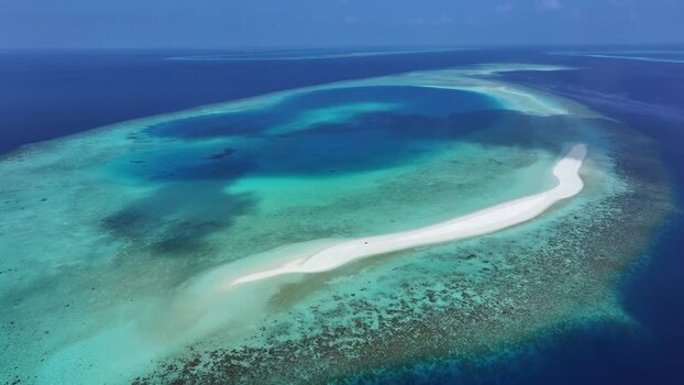 Aerial view of a tropical sandbank and coral reef Maldives. Aerial view of a tropical sandbank and coral reef Maldives.