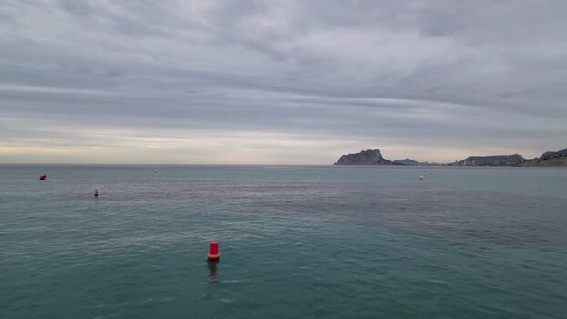 Aerial view of Penon de Ifach and the Mediterranean Sea Spain.