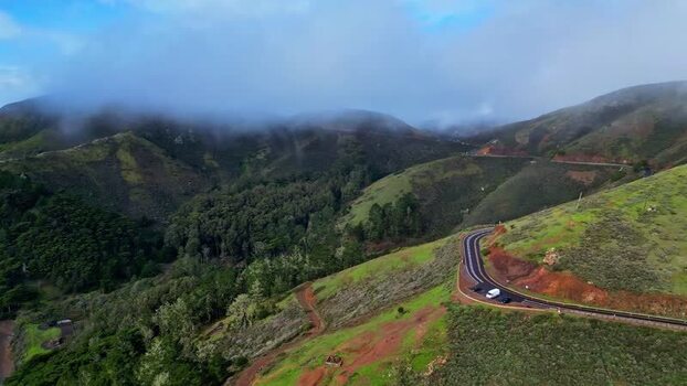 Aerial view of winding road in hills United States.