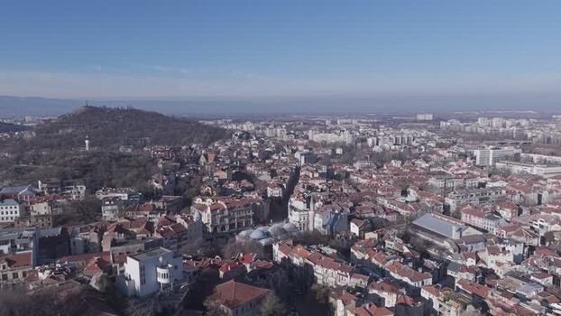 Aerial view of Plovdiv city rooftops and historic hills Bulgaria.