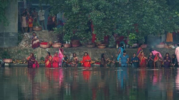 View of people performing a ritual in the water Bangladesh. View of people performing a ritual in the water Bangladesh.