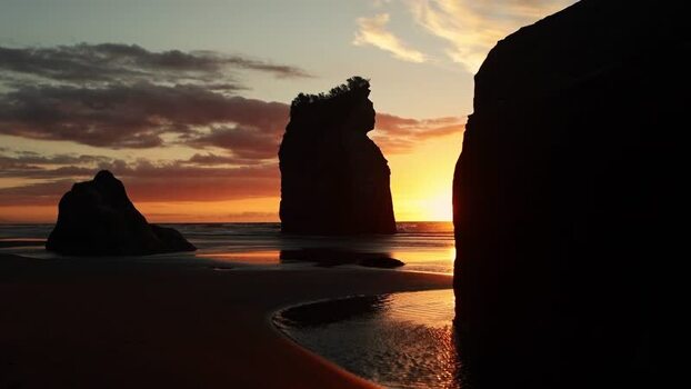 View of sea stacks at sunset New Zealand. View of sea stacks at sunset New Zealand.