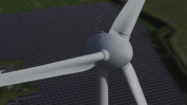 Aerial view of wind turbine and solar farm in T Zand Netherlands.