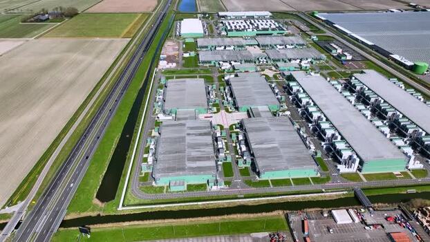 Aerial view of a large data center complex in Middenmeer Netherlands.