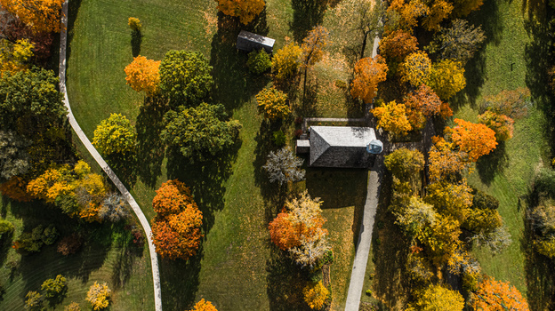 Aerial view of Sigulda Castle surrounded by vibrant autumn trees and winding pathways in Sigulda Sigulda Municipality Latvia. Aerial view of Sigulda Castle surrounded by vibrant autumn trees and winding pathways in Sigulda Sigulda Municipality Latvia.