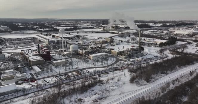 Aerial view of an industrial plant with smoking chimneys United States. Aerial view of an industrial plant with smoking chimneys United States.