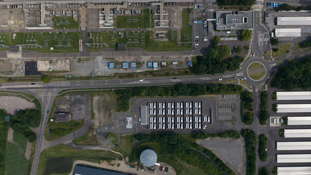 Aerial view of Battery Energy Storage Park Beside Traditional Power Plant Aerial view of Battery Energy Storage Park Beside Traditional Power Plant