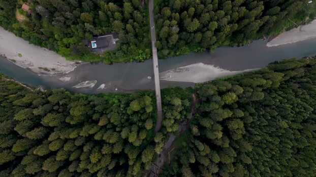 Aerial view of a bridge over a river in a forest United States. Aerial view of a bridge over a river in a forest United States.