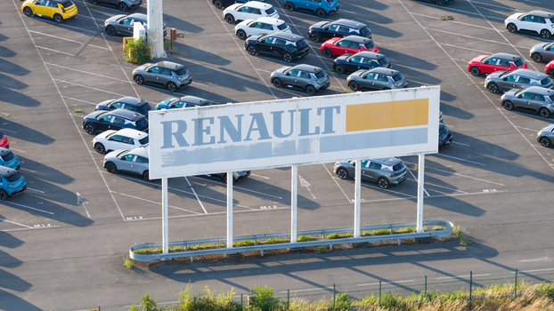 Lambres lez Douai France 07 July 2026 Aerial view of the AESC France battery plant site featuring a prominent Renault sign and rows of parked cars in a large asphalt lot.
