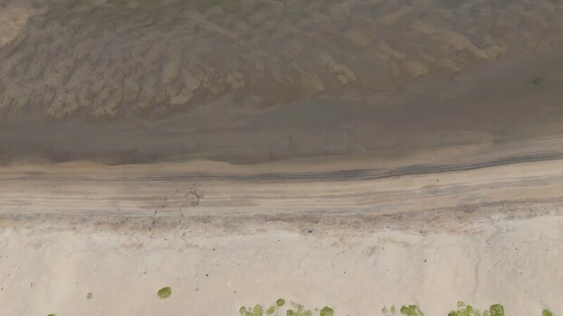 Aerial view of the sandy shoreline and shallow waters Greenland. Aerial view of the sandy shoreline and shallow waters Greenland.