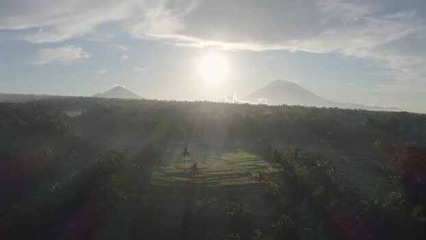 Aerial view of rice terraces and mountains at sunrise Indonesia. Aerial view of rice terraces and mountains at sunrise Indonesia.
