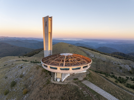 Aerial view of the Buzludzha Monument a brutalist structure on a mountain peak at sunset Stara Zagora Bulgaria. Aerial view of the Buzludzha Monument a brutalist structure on a mountain peak at sunset Stara Zagora Bulgaria.