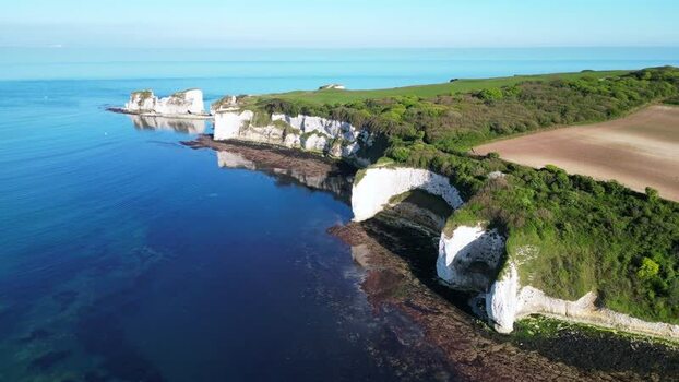 Aerial view of Old Harry Rocks and white chalk cliffs United Kingdom.