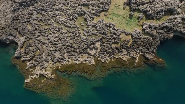 Aerial view of the rocky coastline of Plemmirio Italy.