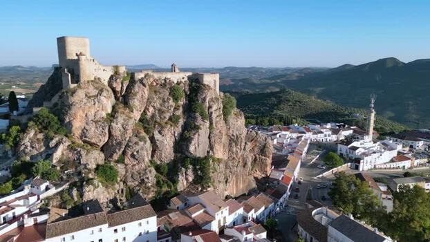 Aerial view of Olvera Castle and the white village in Spain. Aerial view of Olvera Castle and the white village in Spain.