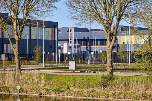 Middenmeer Netherlands 14 April 2026 View of the Microsoft datacenter AMS13 with its modern facade industrial cooling systems and surrounding green landscape under a clear blue sky. Middenmeer Netherlands 14 April 2026 View of the Microsoft datacenter AMS13 with its modern facade industrial cooling systems and surrounding green landscape under a clear blue sky.