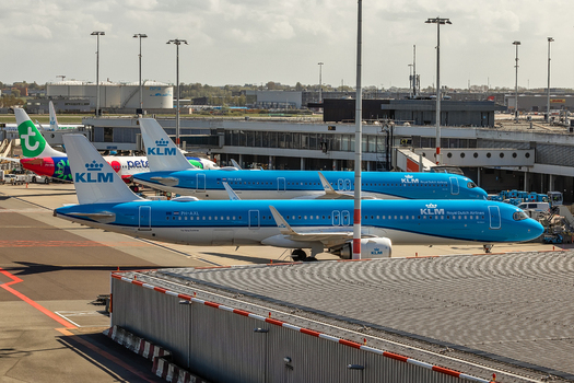 Schiphol Netherlands 16 April 2026 View of KLM Royal Dutch Airlines airplanes parked at the terminal gates of Schiphol Airport under a bright sky. Schiphol Netherlands 16 April 2026 View of KLM Royal Dutch Airlines airplanes parked at the terminal gates of Schiphol Airport under a bright sky.