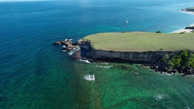 Aerial view of Mausui Savanna and coastal cliffs Indonesia.