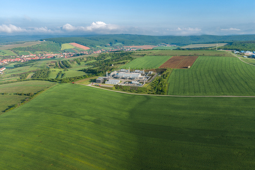 Aerial view of UGS Damborice underground gas storage facility surrounded by lush green fields and rolling hills Damborice South Moravian Region Czechia. Aerial view of UGS Damborice underground gas storage facility surrounded by lush green fields and rolling hills Damborice South Moravian Region Czechia.