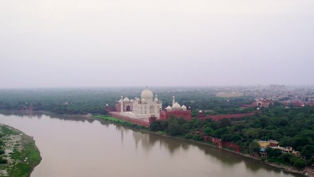 Aerial view of Taj Mahal by the Yamuna River in Agra India. Aerial view of Taj Mahal by the Yamuna River in Agra India.