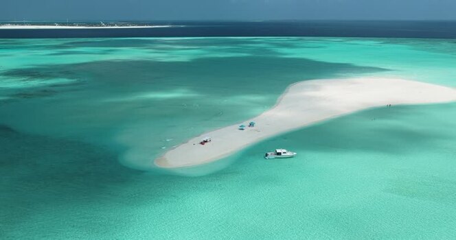 Aerial view of a white sandbank in turquoise waters Maldives. Aerial view of a white sandbank in turquoise waters Maldives.