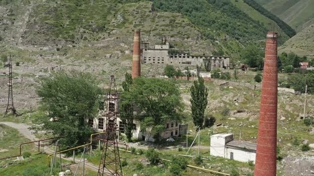 Aerial view of abandoned factory in Caucasus Mountains Russia.