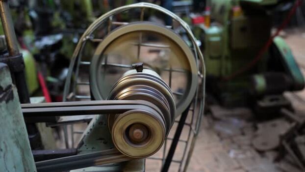 View of industrial machinery belt and pulley system Bangladesh. View of industrial machinery belt and pulley system Bangladesh.