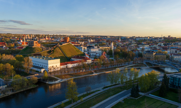 Aerial view of Gediminas Tower and the Palace of the Grand Dukes of Lithuania by the Neris River at sunset Vilnius County Lithuania. Aerial view of Gediminas Tower and the Palace of the Grand Dukes of Lithuania by the Neris River at sunset Vilnius County Lithuania.