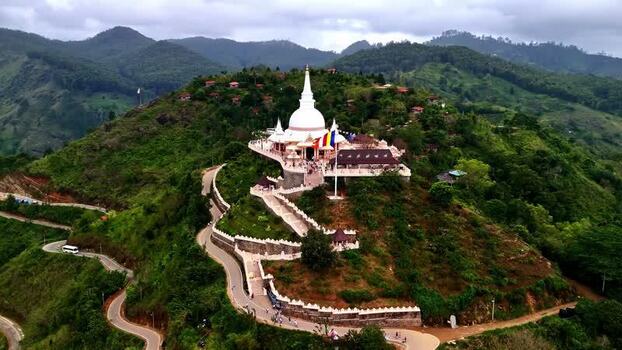 Aerial view of Ambuluwawa Tower on a mountain peak Sri Lanka.