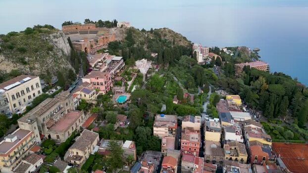 Aerial view of the ancient Greek theater and town in Taormina Italy. Aerial view of the ancient Greek theater and town in Taormina Italy.