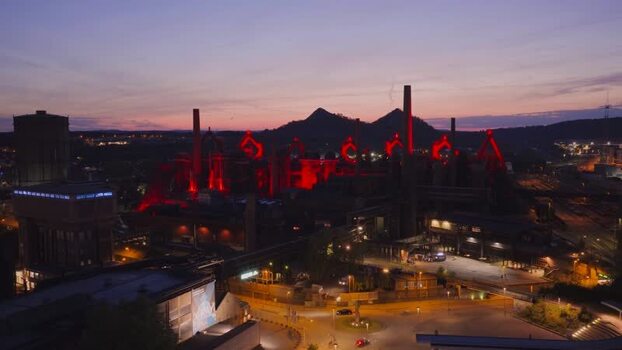 Aerial view of Volklingen Ironworks illuminated at dusk Germany. Aerial view of Volklingen Ironworks illuminated at dusk Germany.