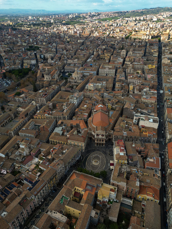 Aerial view of Teatro Massimo Bellini and the historic rooftops of the city center Catania Sicily Italy. Aerial view of Teatro Massimo Bellini and the historic rooftops of the city center Catania Sicily Italy.
