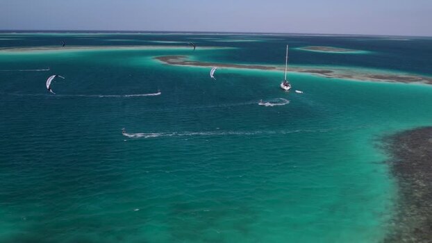 Aerial view of kitesurfing in Los Roques archipelago Venezuela.