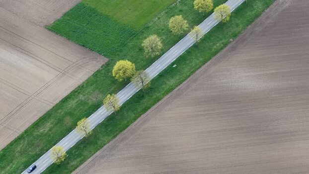 Aerial view of road with truck and van France.
