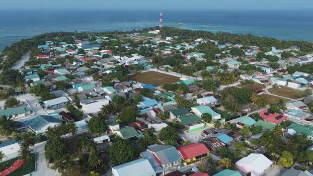 Aerial view of the coastal village of Makunudhoo Maldives. Aerial view of the coastal village of Makunudhoo Maldives.